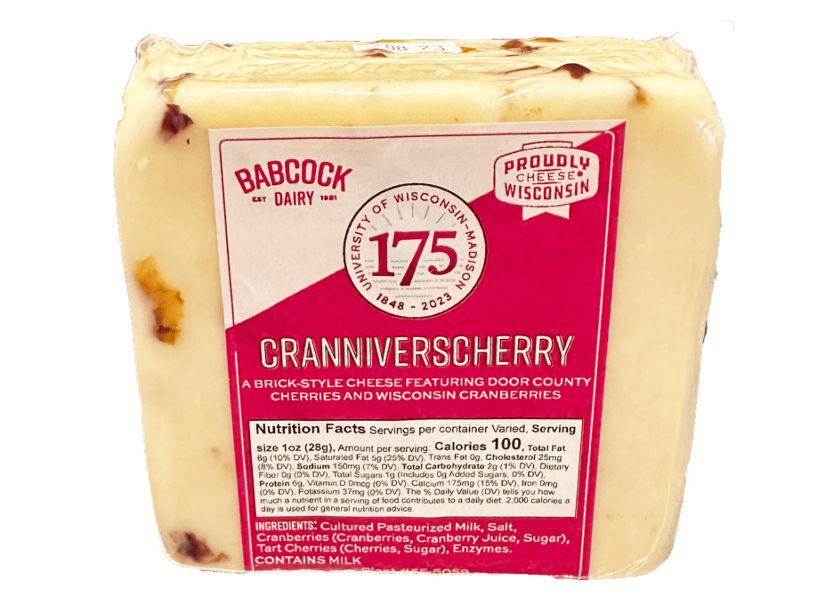 A block of Cranniverscherry cheese: a Brick-style cheese with bits of cranberries and cherries visible.